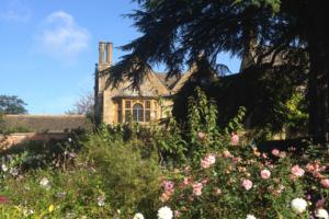 A view of Hidecote House from the gardens