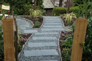 Slate stepping through garden