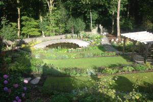 View from house of terraced gardens and pond