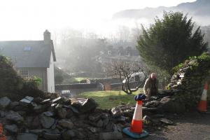 Traditionally built drystone retaining wall in Langdale