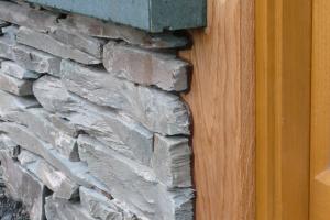 Stone wall and slate cill detail