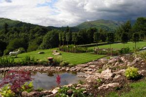 The pond relates to the view