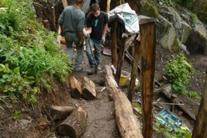 Creating wood steps up to higher level of the garden